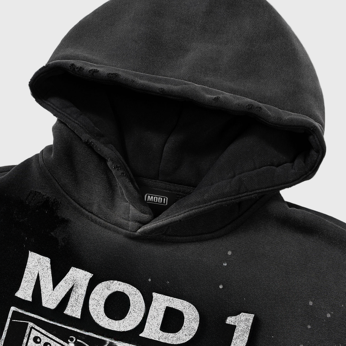 Black hoodie with 'MOD 1' branding on a white background