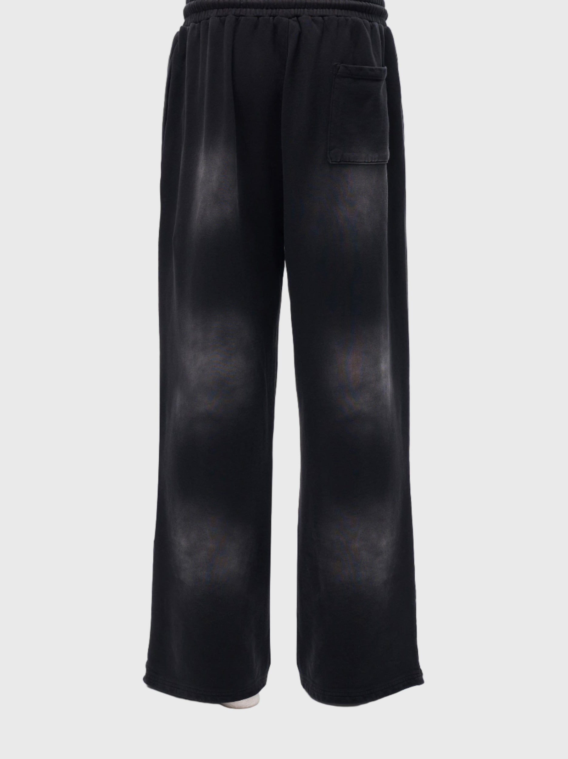 Black MOD 1 wide leg pants on a light gray background
