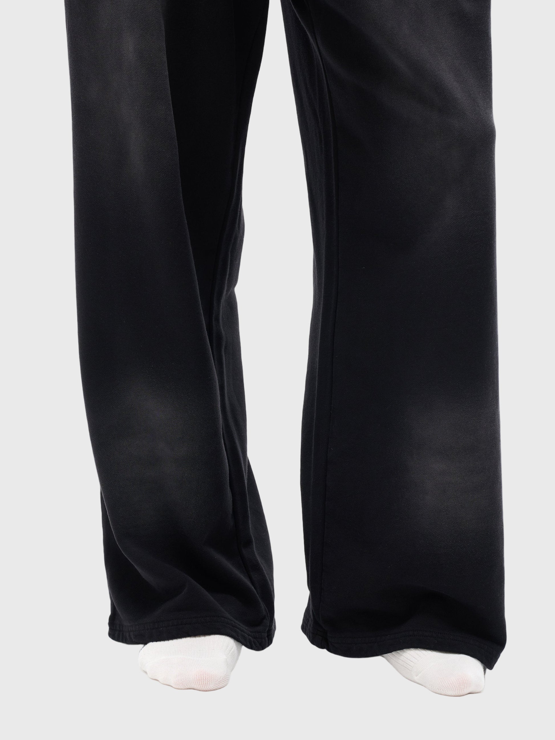 Black Mod 1 wide leg  pants on a light gray background